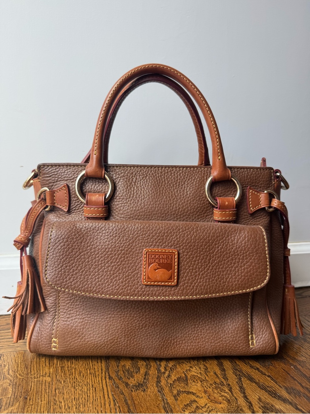 Dooney & Bourke Brown Pebbled Leather Satchel with Tan Trim and Tassels